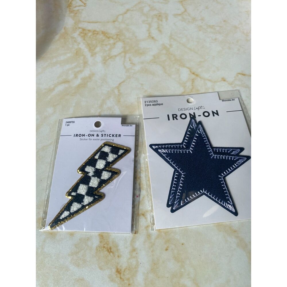 Set of 2 iron-ons New in Package Lightning and Navy Stars
